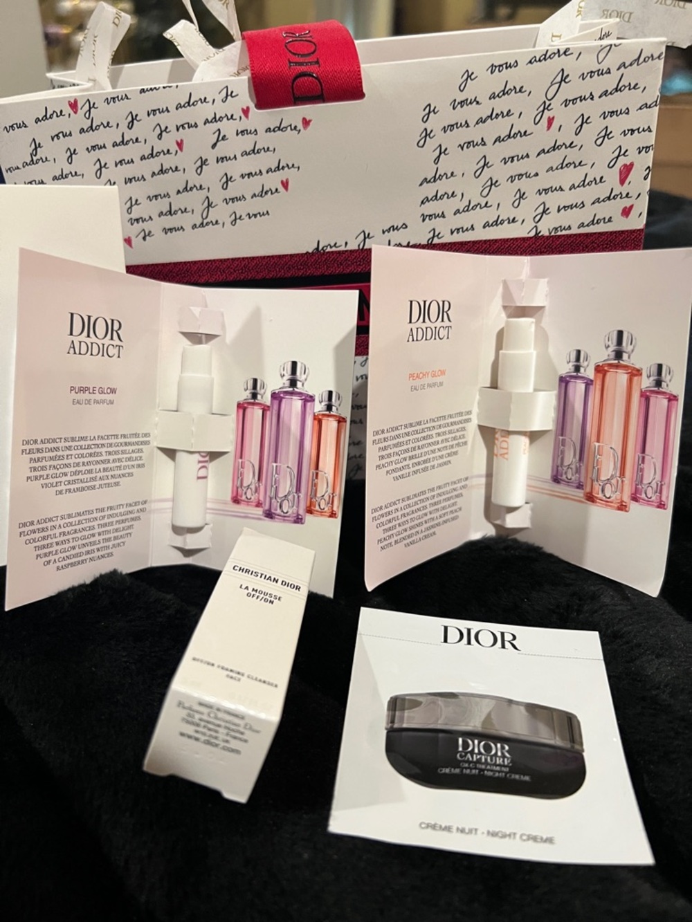 Dior samples in the raffia pouch with envelope and gift bag.